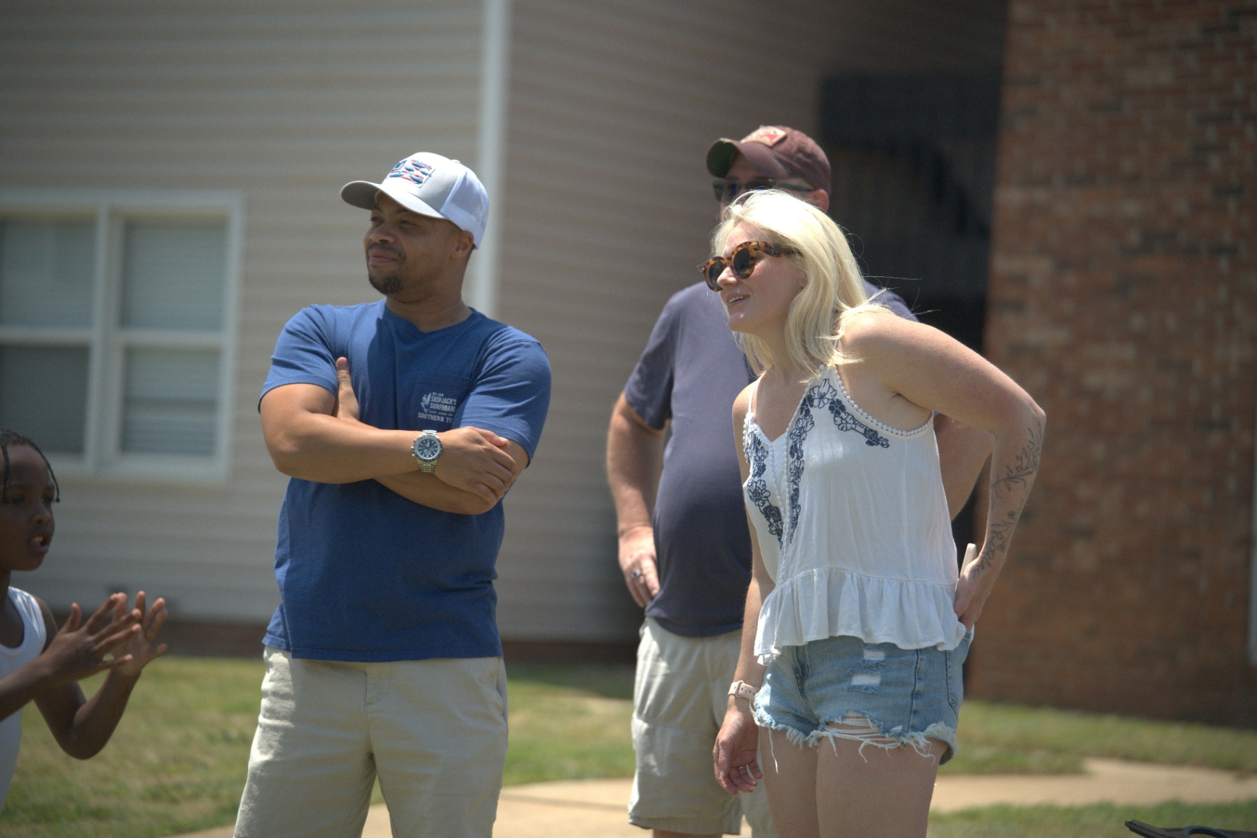 Neighbors chatting at a community event